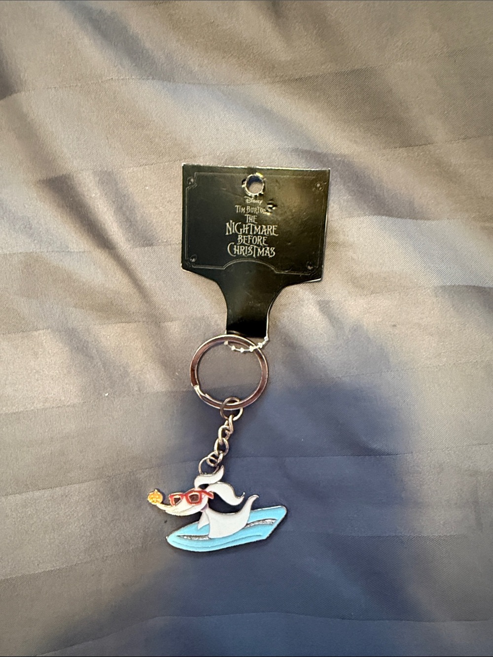 The Nightmare Before Christmas Zero Surfing Keychain
